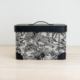 Alaric storage box featuring an exotic black and white print with a sleek black lid for stylish organization.