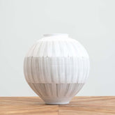 Large hand-painted ceramic vase with white-washed finish and lined pattern, perfect for fresh or dried flowers and modern or boho décor.