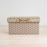 Aris storage box handwoven with premium materials and accented with a gold-tone clasp.