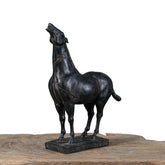 Unique hand-carved war horse sculpture with aged cracks and artisanal detail. A one-of-a-kind art piece that adds elegance and character to any space.