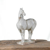 Unique hand-carved war horse sculpture with aged cracks and artisanal detail. A one-of-a-kind art piece that adds elegance and character to any space.