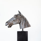 Contemporary horse head statue crafted in resin with a solid marble base, modern decor piece.