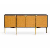 Black wood-grain sideboard with woven rattan doors and forged brass-toned legs.