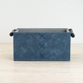 Lucan storage box in navy and cream with leather-look finish and convenient side handles.