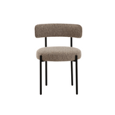 Nicola Dining Chair with a sleek fabric seat and sturdy steel legs, featuring a minimalistic modern design ideal for contemporary kitchens and dining spaces.