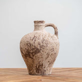 Handmade Grecian-style ceramic jug with metallic glaze and aged finish, perfect for rustic, Mediterranean, or boho home décor.