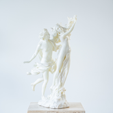 Elegant resin sculpture of Apollo and Daphne from classical mythology