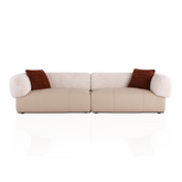 Beige sofa with brown cushions on a white background