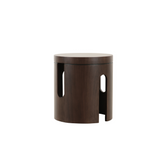 Designer walnut veneer side table with round form, blending natural wood grain with modern style.