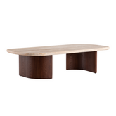 Elegant coffee table with a smooth travertine top and dual dark wood pedestal legs, perfect for modern interiors.