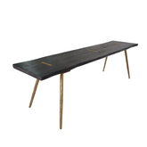 Caen Bench in dark-stained ash wood with gold metal leg accents, showcasing a sleek mid-century modern design for versatile luxury seating.