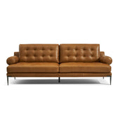 Kimberly luxury sofa in premium Brazilian top grain leather with button detailing, cylindrical bolster arms, black iron metal legs, designer leather sofa for modern living spaces.