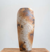 Rustic terracotta floor vase with oxidized patina finish, handcrafted decorative home décor.