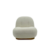 Modern white boucl?? accent chair with curved silhouette and metal base