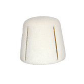 Lohya Ottoman cone-shaped in boucle fabric with brass gold strip accents, modern luxury design.