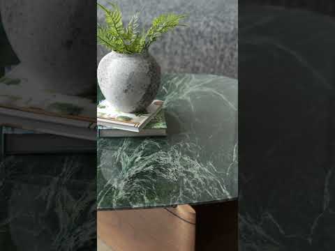 Video showcasing the Bolzano Coffee Table with its emerald green marble top and walnut veneer legs, styled in a modern living room setting.