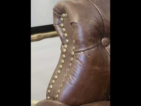Video showcasing the Vannes Armchair with top-grain leather upholstery and wrought iron frame, highlighting its classic design, craftsmanship, and luxurious comfort.