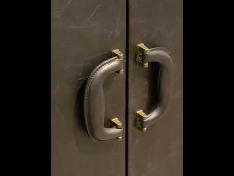 Video showcasing the Lille Dining Table with a smooth ash wood top and intricately crafted forged iron legs, styled in a modern dining space.