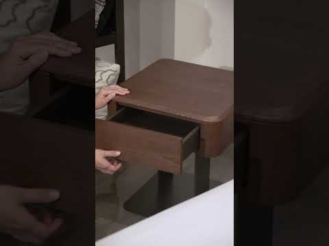 Modern wood bedside table with drawer and steel base – Ravello nightstand in minimalist bedroom setup, showing storage features and compact size.