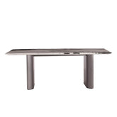 Rovigo dining table featuring a rectangular panda white marble top with grey titanium brushed stainless steel legs in a modern dining room setting