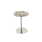 Snok Side Table with a unique marble top and silver base styled in a modern luxury living room.