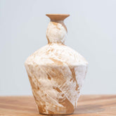 Modern decorative ceramic vase with unique hand-painted white wash and textured surface, perfect for table displays and floral arrangements