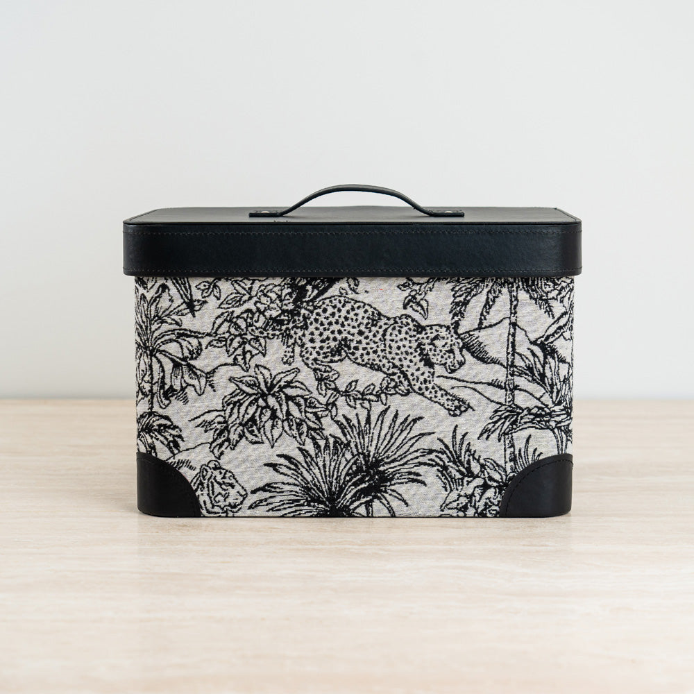 Alaric storage box featuring an exotic black and white print with a sleek black lid for stylish organization.