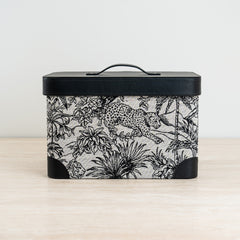 Alaric storage box featuring an exotic black and white print with a sleek black lid for stylish organization.