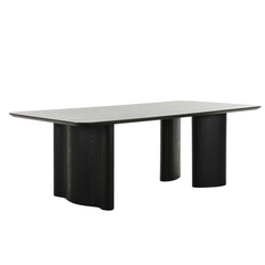 Ankara dining table in dark ash finish with sculptural geometric legs, a modern statement piece for elegant dining rooms.