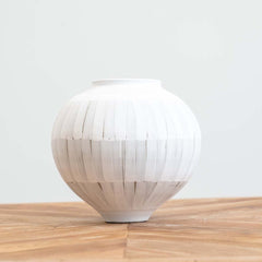 Medium hand-painted ceramic vase with white-washed finish and lined pattern, ideal for fresh or dried flowers and modern or boho décor.