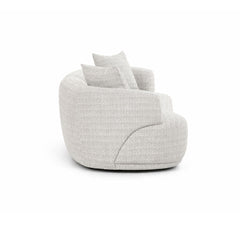 Designer sectional sofa in grey and white textured upholstery, featuring a sculptural curved form ideal for open-plan and designer interiors.