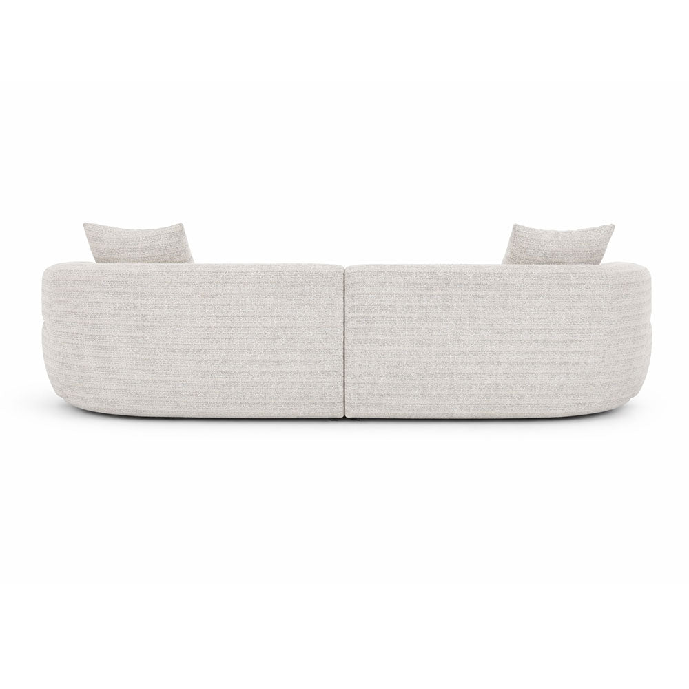 Elegant curved sectional sofa with plush seating and neutral woven fabric, perfect as a statement piece in modern and contemporary living spaces.