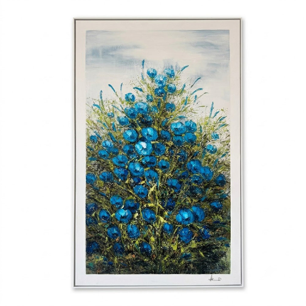 A framed vertical painting featuring a dense cluster of vibrant blue flowers with green stems and leaves against a soft, light blue and white sky background.
