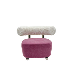 Statement lounge chair featuring a colorful seat and soft, fluffy backrest on a sleek metal frame, perfect for playful modern interiors.