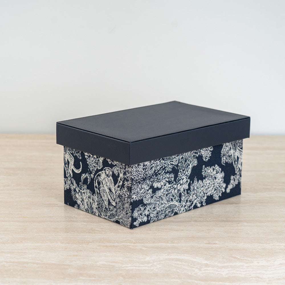High-quality storage box set with black and ivory botanical art, perfect for shelves or desks.