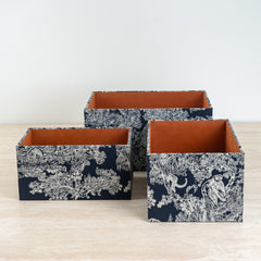 Minimalist storage box combining simple modern lines with a bold botanical print