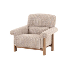 Contemporary armchair upholstered in textured fabric with a timber frame, combining modern comfort with vintage-inspired design.