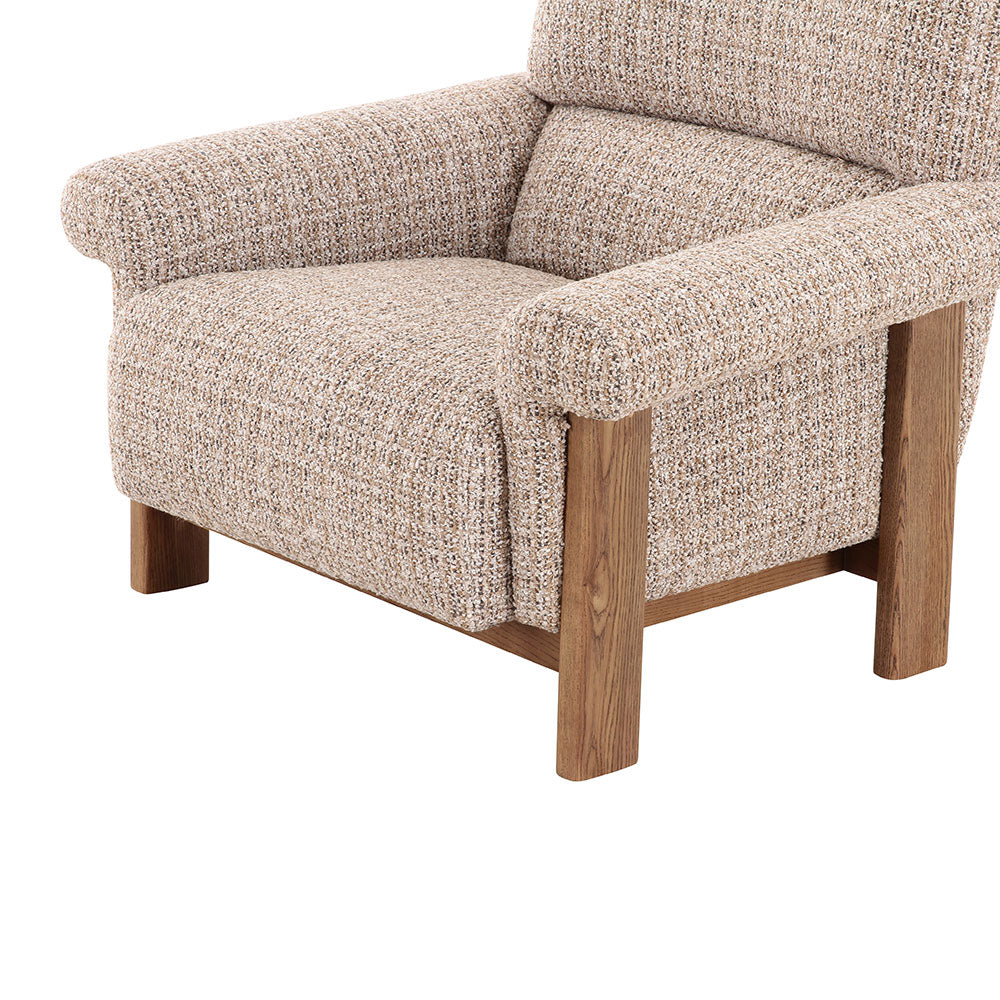 Stylish accent armchair featuring premium fabric upholstery and exposed timber legs, perfect for modern and transitional interiors.
