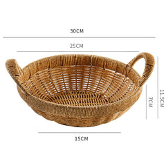 Classic round bowl-style plastic rattan storage basket with sturdy handles, suitable for accessories, kitchen items, or décor.