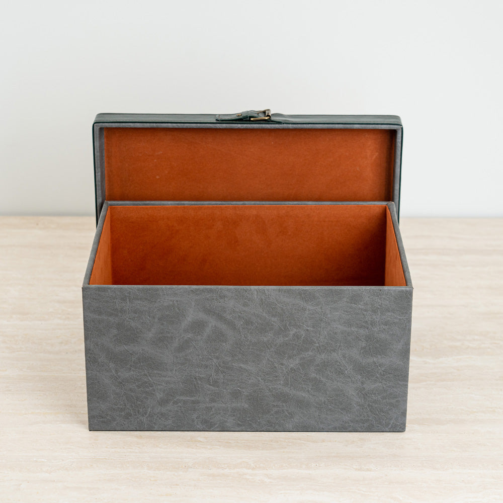 Premium two-tone storage chest that adds a polished touch to any space.