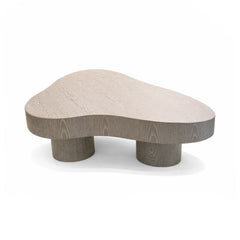 Modern coffee table with a wavy design on a white background