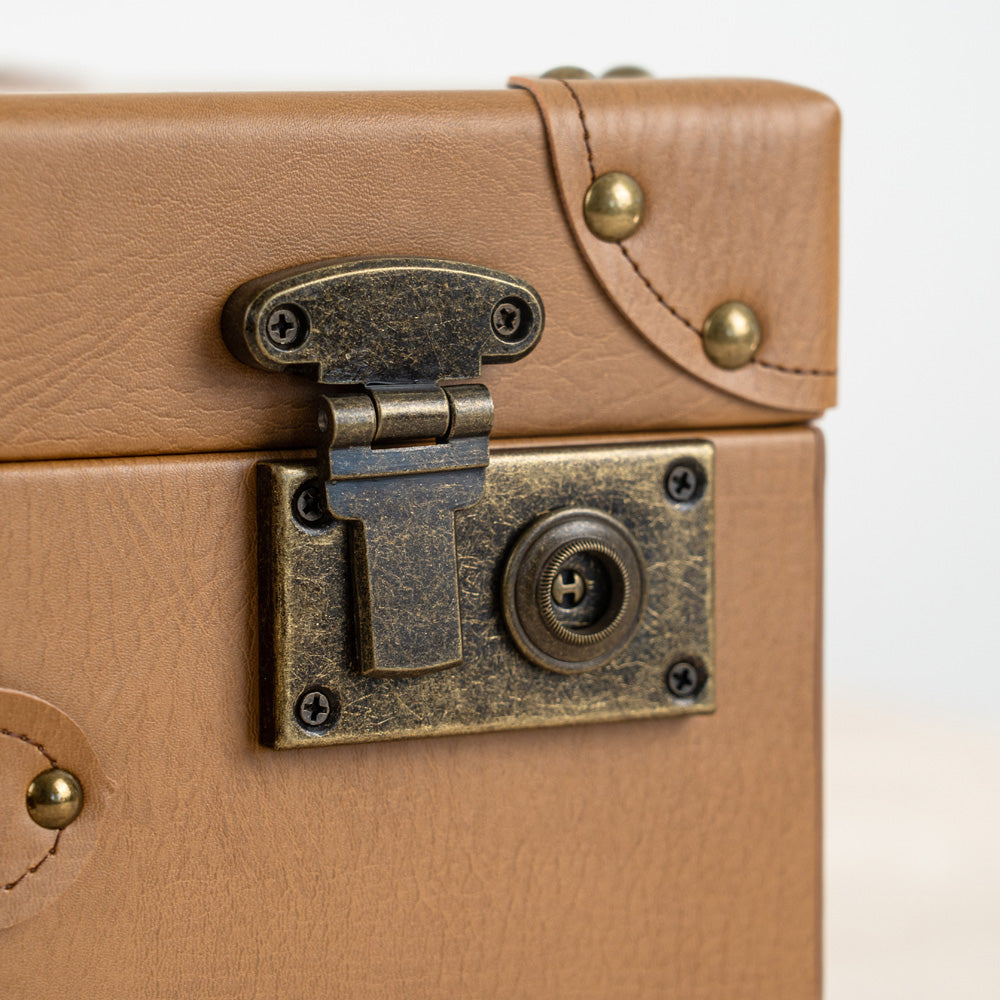 Stylish compact storage chest for documents, clothing, and accessories.