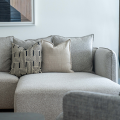 High-quality fabric L-shaped sectional sofa featuring hardwood and metal support, comfortable deep seating, and modern design.