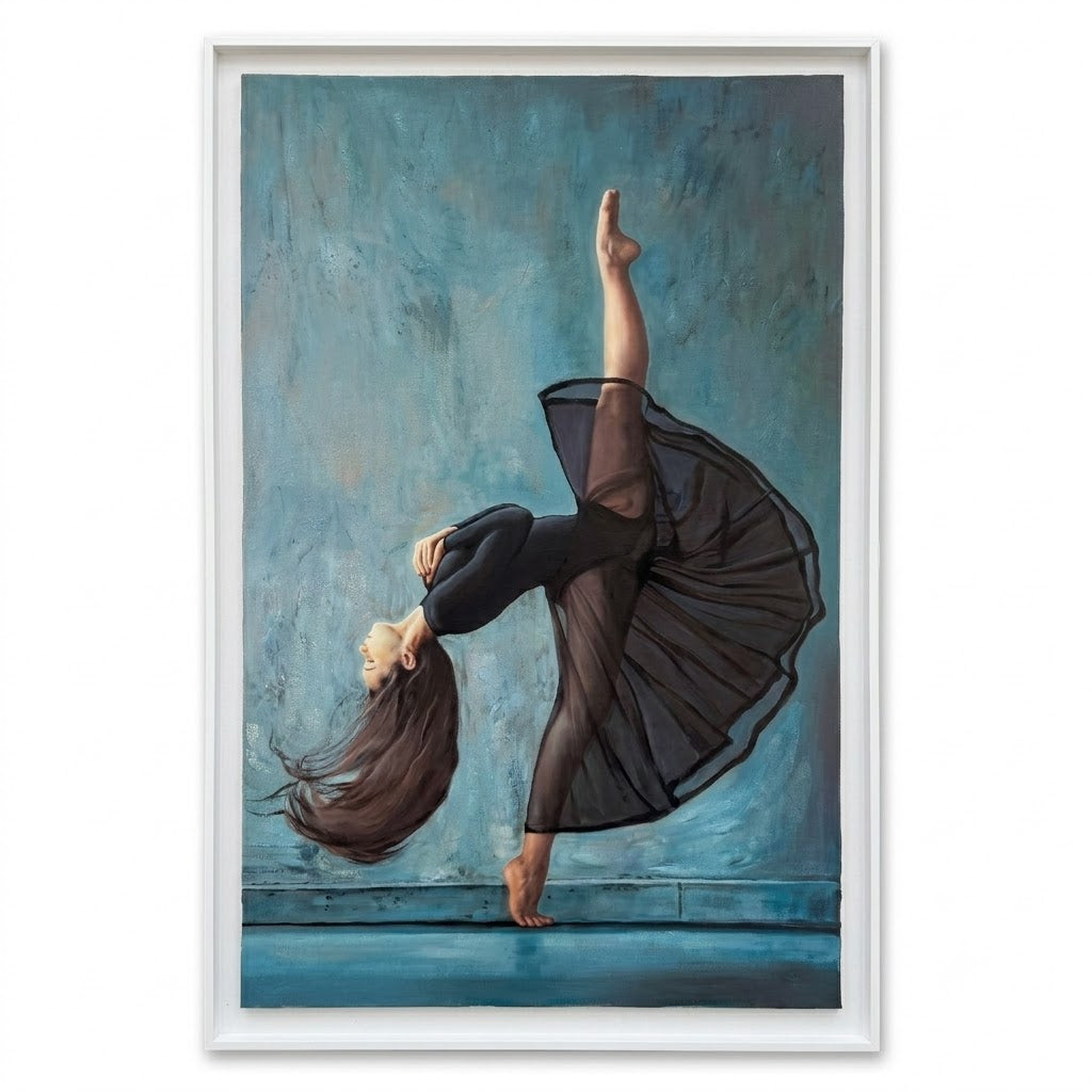 A framed vertical art print depicting a female dancer performing an elegant backbend pose against a textured blue background, enclosed in a thin white frame.