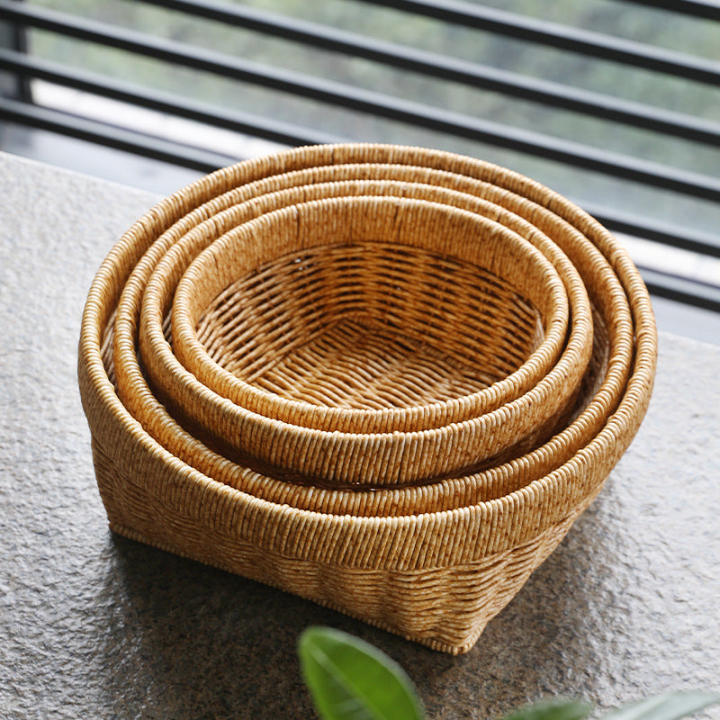 Elegant woven storage basket set with a unique square base design for stylish home organization.