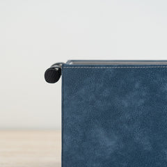 Stylish storage organizer featuring a navy and cream color combination.