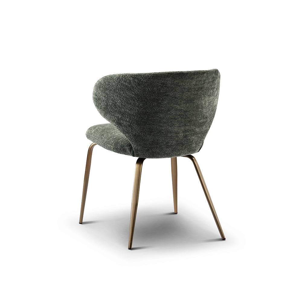 High-quality green dining chair with plush fabric upholstery and brass metal base, a refined seating choice for stylish dining areas.