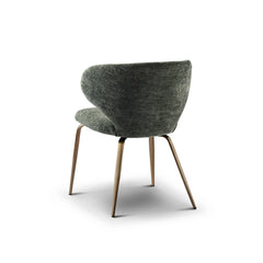 High-quality green dining chair with plush fabric upholstery and brass metal base, a refined seating choice for stylish dining areas.