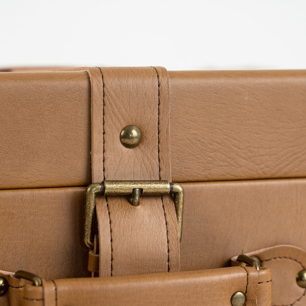 Decorative storage box with durable materials and vintage aesthetic.