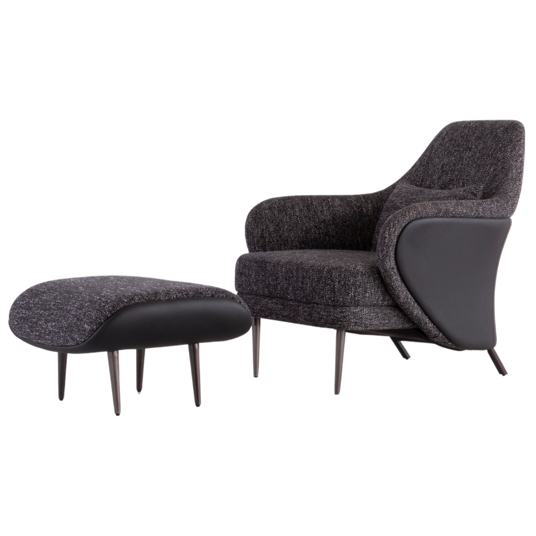 Modern luxury armchair set upholstered in premium cotton linen fabric with matching ottoman and sleek stainless steel frame.